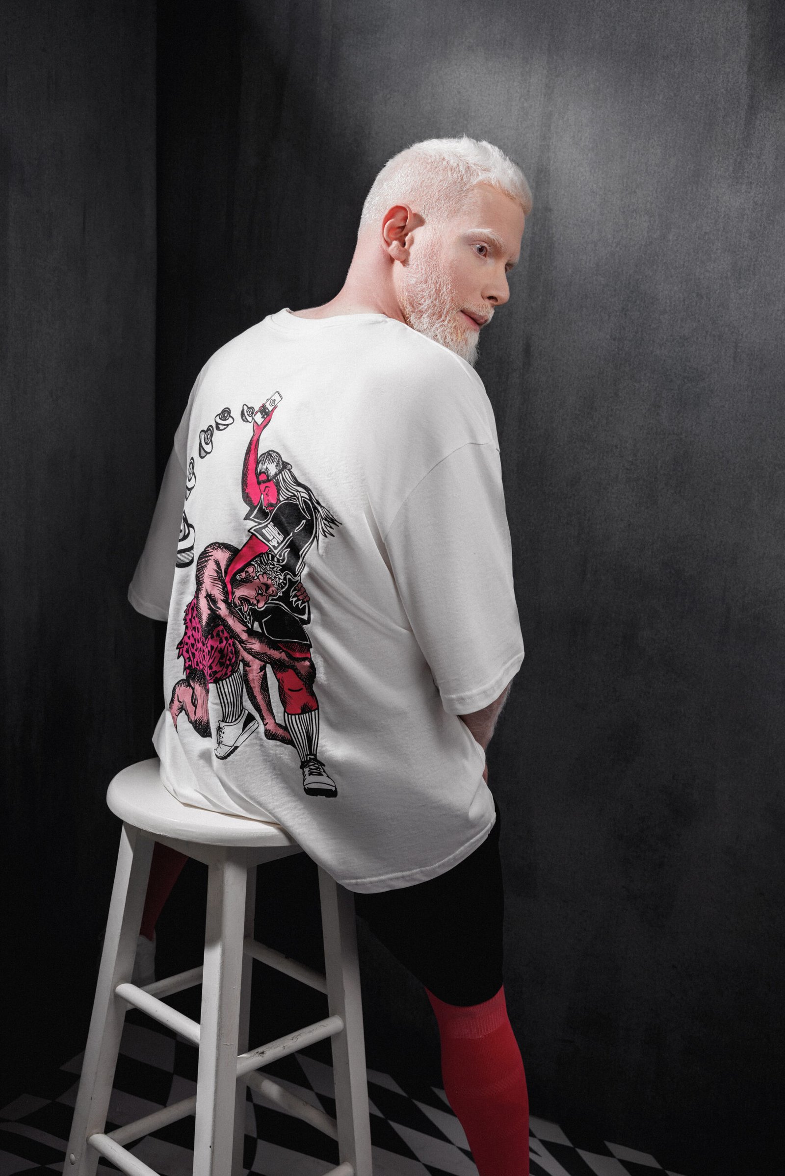 Back view of white Makouk t-shirt with bold graphic print. Designed by Mohamad Ali Makouk for Makouk Studios.